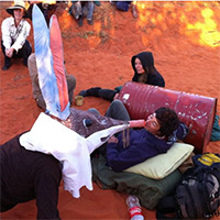 Two Protesters locked in to a 44 gallon drum