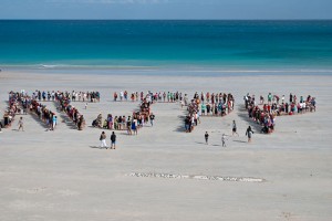 Community gather at Cable Beach to spell No Gas at James Price Point