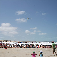 Broome locals unfurl massive "Protect the Kimberley" banner on Cable Beach