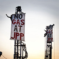 Protectors atop Woodside Drilling Rigs